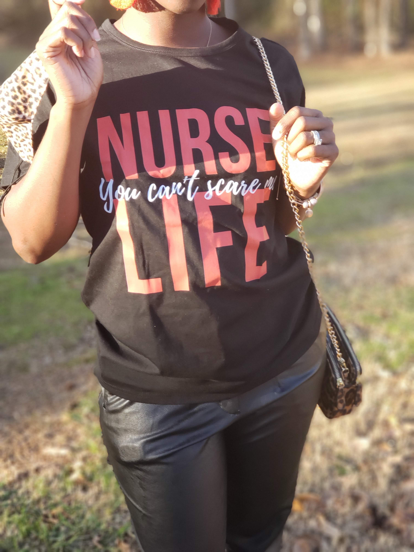Designed and made with a 60/40 cotton-polyester blend for comfort and durability. Adult sizes Small - 2X. Available in red and pink!